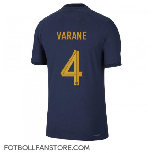Frankrike Raphael Varane #4 Hemma matchtröja VM 2022 Kortärmad Billigt